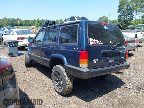 2000 Jeep Cherokee z VIN 1J4FF48S7YL120307, wystawiony jako IAAI lot #42818178 z przebiegiem 160 334 mil mil oraz . Historia ofert i sprzedaży dostępna na DreamBid. Obrazek 3.