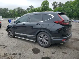 2020 Honda CR-V Touring with VIN 5J6RW2H93LL014590, listed as a Copart auction lot 53720635 with 63,951 mi miles and Salvage title. Bid and sale history available at DreamBid. Image 2.
