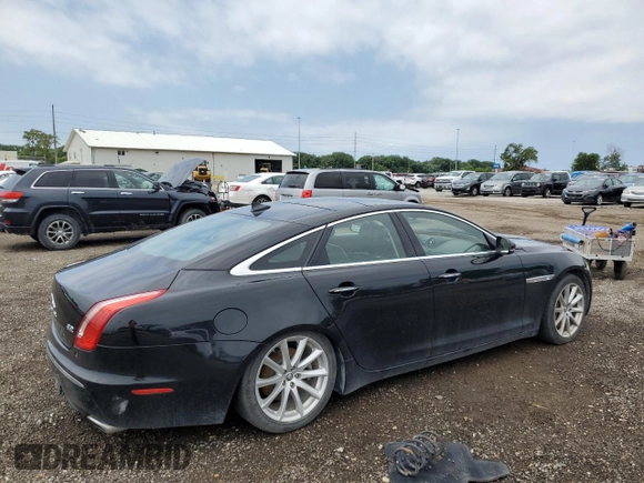 2013 Jaguar XJ с VIN SAJWJ1CD8D8V52463, выставлен на аукционе Copart как лот 61772115 с пробегом 123 899 миль миль и Чистый • Clean title. История ставок и продаж доступна на DreamBid. Изображение 3.