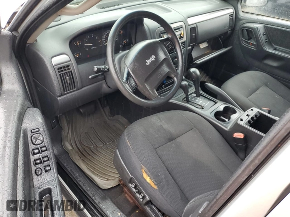 2004 Jeep Grand Cherokee Laredo z VIN 1J4GW48S74C288625, wystawiony jako Copart lot #61290805 z przebiegiem 194 615 mil mil oraz Czysty tytuł • Clean title. Historia ofert i sprzedaży dostępna na DreamBid. Obrazek 8.