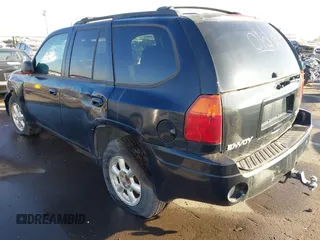 2005 GMC Envoy SLE with VIN 1GKDT13S752161375, listed as a IAAI auction lot 40945627 with 172,757 mi miles. Bid and sale history available at carsss.com. Image 3.