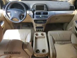 2008 Honda Odyssey Touring z VIN 5FNRL38968B025520, wystawiony jako Copart lot #60799645 z przebiegiem 116 592 mil mil oraz Szkoda całkowita • Salvage title. Historia ofert i sprzedaży dostępna na DreamBid. Obrazek 8.