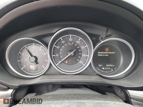 2017 Mazda CX-5 Grand Touring with VIN JM3KFADL3H0125143, listed as a Copart auction lot 50178005 with 160,058 mi miles and Salvage Title. Bid and sale history available at carsss.com. Image 9.