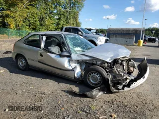 1998 Honda Civic CX with VIN 2HGEJ6427WH121499, listed as a Copart auction lot 73657704 with 101,999 mi miles and Salvage Title. Bid and sale history available at DreamBid. Image 4.