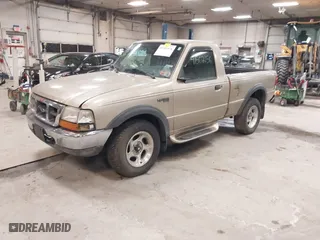 1999 Ford Ranger XLT with VIN 1FTYR11X0XTA72917, listed as a IAAI auction lot 41502156 with 106,585 mi miles. Bid and sale history available at carsss.com. Image 2.