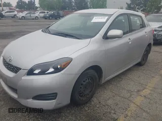 2009 Toyota Matrix with VIN 2T1KU40E49C130897, listed as a IAAI auction lot 42164096 with 140,273 mi miles. Bid and sale history available at carsss.com. Image 2.