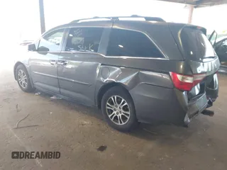 2012 Honda Odyssey EX-L with VIN 5FNRL5H67CB016934, listed as a IAAI auction lot 42405714 with 248,512 mi miles and . Bid and sale history available at DreamBid. Image 3.