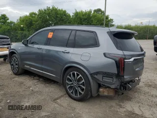 2021 Cadillac XT6 AWD Sport z VIN 1GYKPHRS9MZ165189, wystawiony jako Copart lot #58482665 z przebiegiem Nie podano mil oraz Szkoda całkowita • Salvage title. Historia ofert i sprzedaży dostępna na DreamBid. Obrazek 2.