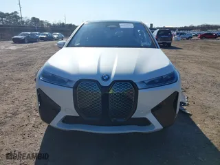 2023 BMW iX xDrive50 with VIN WB523CF0XPCM07644, listed as a IAAI auction lot 41867027 with 18,759 mi miles. Bid and sale history available at carsss.com. Image 13.