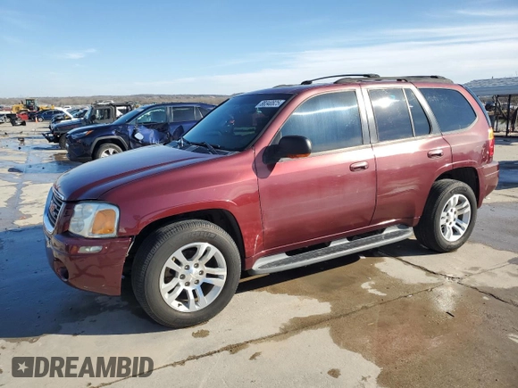 2003 GMC Envoy SLT with VIN 1GKDT13S732378731, listed as a Copart auction lot 88340825 with 125,814 mi miles and Salvage Title. Bid and sale history available at carsss.com. Image 1.