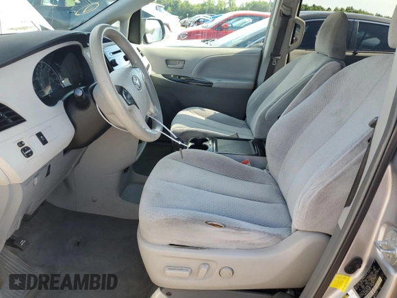 2012 Toyota Sienna LE AAS with VIN 5TDKK3DC8CS193671, listed as a Copart auction lot 63836955 with 257,868 mi miles and Salvage title. Bid and sale history available at DreamBid. Image 7.