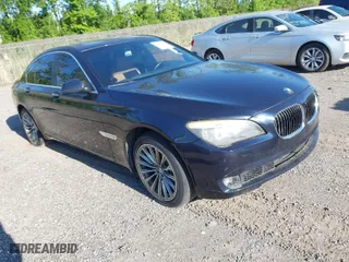 2011 BMW 7 Series 740i with VIN WBAKA4C52BC392112, listed as a IAAI auction lot 41736939 with 125,953 mi miles. Bid and sale history available at carsss.com. Image 1.