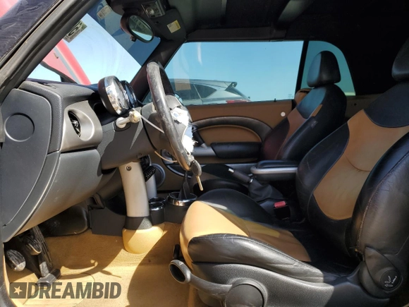 2005 MINI Convertible S with VIN WMWRH33535TF84456, listed as a Copart auction lot 50120725 with 149,840 mi miles and Salvage Title. Bid and sale history available at DreamBid. Image 7.