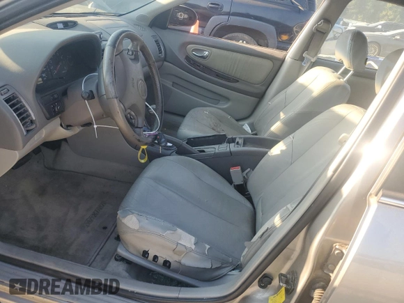 2001 Nissan Maxima GXE z VIN JN1CA31D11T828767, wystawiony jako Copart lot #69504024 z przebiegiem 177 431 mil mil oraz Szkoda całkowita • Salvage title. Historia ofert i sprzedaży dostępna na DreamBid. Obrazek 7.