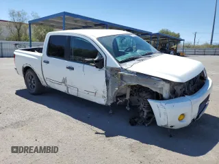 2015 Nissan Titan Pro-4X z VIN 1N6AA0EC9FN512658, wystawiony jako Copart lot #68066964 z przebiegiem 131 026 mil mil oraz Szkoda całkowita • Salvage title. Historia ofert i sprzedaży dostępna na DreamBid. Obrazek 4.
