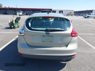 2015 Ford Focus SE with VIN 1FADP3K21FL222119, listed as a IAAI auction lot 42146787 with 148,091 mi miles and . Bid and sale history available at DreamBid. Image 16.