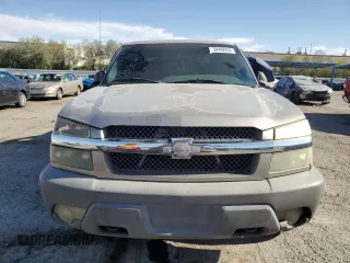 2002 Chevrolet Avalanche z VIN 3GNEC13T62G249465, wystawiony jako Copart lot #58482255 z przebiegiem 209 864 mil mil oraz Czysty tytuł • Clean title. Historia ofert i sprzedaży dostępna na DreamBid. Obrazek 5.