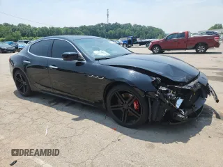 2014 Maserati Ghibli S Q4 with VIN ZAM57RTA5E1122165, listed as a Copart auction lot 60257835 with Not provided miles and Salvage title. Bid and sale history available at DreamBid. Image 4.