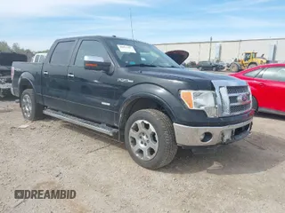 2011 Ford F-150 XLT with VIN 1FTFW1ET3BFC15177, listed as a IAAI auction lot 40412307 with 156,183 mi miles. Bid and sale history available at carsss.com. Image 1.