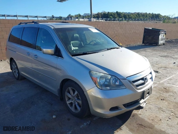 2005 Honda Odyssey EX-L with VIN 5FNRL38795B039731, listed as a IAAI auction lot 41844588 with 150,738 mi miles. Bid and sale history available at carsss.com. Image 1.