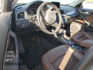 2016 Audi Q3 Prestige z VIN WA1GFCFS1GR009409, wystawiony jako Copart lot #52352845 z przebiegiem Nie podano mil oraz Szkody całkowita. Historia ofert i sprzedaży dostępna na DreamBid. Obrazek 8.