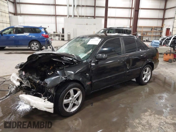 2003 Mazda Protege DX with VIN JM1BJ226431112902, listed as a IAAI auction lot 41939907 with 184,618 mi miles and . Bid and sale history available at DreamBid. Image 2.