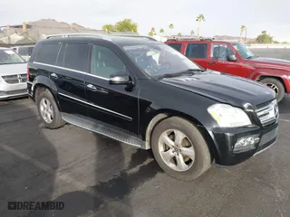 2011 Mercedes-Benz GL-Class GL 450 with VIN 4JGBF7BE1BA752615, listed as a IAAI auction lot 41075508 with 165,605 mi miles. Bid and sale history available at carsss.com. Image 1.