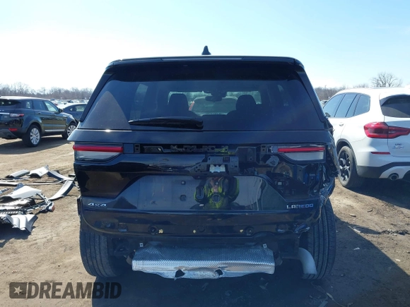2023 Jeep Grand Cherokee Laredo with VIN 1C4RJHAG7PC600196, listed as a IAAI auction lot 41695837 with 19,110 mi miles and . Bid and sale history available at DreamBid. Image 17.