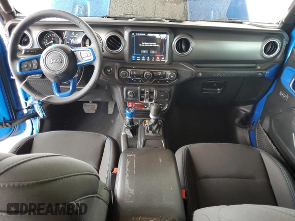 2023 Jeep Wrangler Rubicon with VIN 1C4JJXR69PW581362, listed as a Copart auction lot 58557795 with 34,357 mi miles and Salvage title. Bid and sale history available at DreamBid. Image 8.