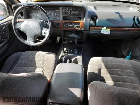 1997 Jeep Grand Cherokee Laredo with VIN 1J4GZ58S1VC747713, listed as a Copart auction lot 55290275 with 159,846 mi miles and Salvage title. Bid and sale history available at DreamBid. Image 8.