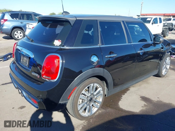 2017 MINI Hardtop 4 Door Cooper S z VIN WMWXU3C56H2D33072, wystawiony jako IAAI lot #41847726 z przebiegiem 81 783 mil mil oraz . Historia ofert i sprzedaży dostępna na DreamBid. Obrazek 4.