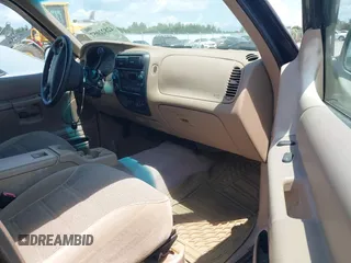 1998 Ford Explorer XL z VIN 1FMZU34X4WUC94388, wystawiony jako IAAI lot #42822057 z przebiegiem 232 117 mil mil oraz . Historia ofert i sprzedaży dostępna na DreamBid. Obrazek 5.
