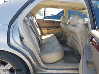 2004 Cadillac DeVille with VIN 1G6KD54Y44U121318, listed as a IAAI auction lot 41833122 with 152,258 mi miles. Bid and sale history available at carsss.com. Image 8.