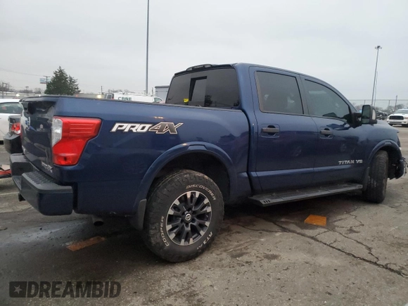 2018 Nissan Titan Pro-4X z VIN 1N6AA1E55JN505223, wystawiony jako Copart lot #85542844 z przebiegiem 113 601 mil mil oraz Szkoda całkowita • Salvage title. Historia ofert i sprzedaży dostępna na DreamBid. Obrazek 3.