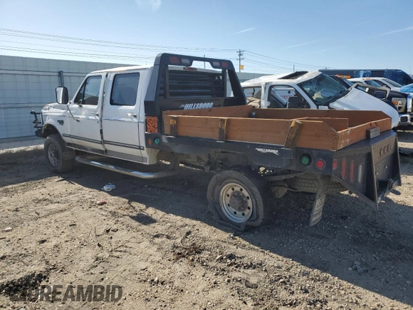 1997 Ford F-350 with VIN 1FTJW36F5VEA13739, listed as a Copart auction lot 56710615 with Not provided miles and Salvage title. Bid and sale history available at DreamBid. Image 2.