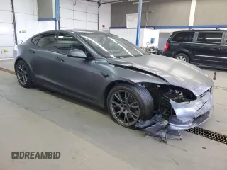 2022 Tesla Model S с VIN 5YJSA1E5XNF488415, выставлен на аукционе Copart как лот 57347565 с пробегом 18 662 миль миль и Списание • Salvage title. История ставок и продаж доступна на DreamBid. Изображение 4.
