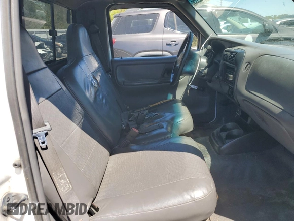 2001 Ford Ranger XL z VIN 1FTYR10D71PB77672, wystawiony jako Copart lot #56221145 z przebiegiem 267 375 mil mil oraz Nie do naprawy • Non repairable. Historia ofert i sprzedaży dostępna na DreamBid. Obrazek 11.