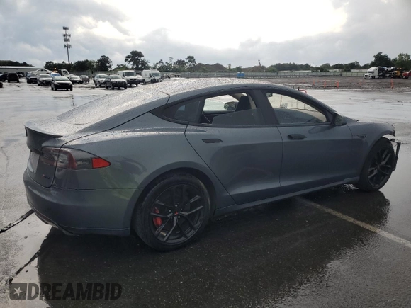 2014 Tesla Model S 60 with VIN 5YJSA1H14EFP28471, listed as a Copart auction lot 64928534 with 99,442 mi miles and Clean Title. Bid and sale history available at DreamBid. Image 3.