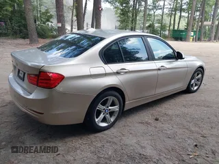 2013 BMW 3 Series 328i xDrive with VIN WBA3B5G53DNP40721, listed as a IAAI auction lot 42614545 with 102,570 mi miles and . Bid and sale history available at DreamBid. Image 4.