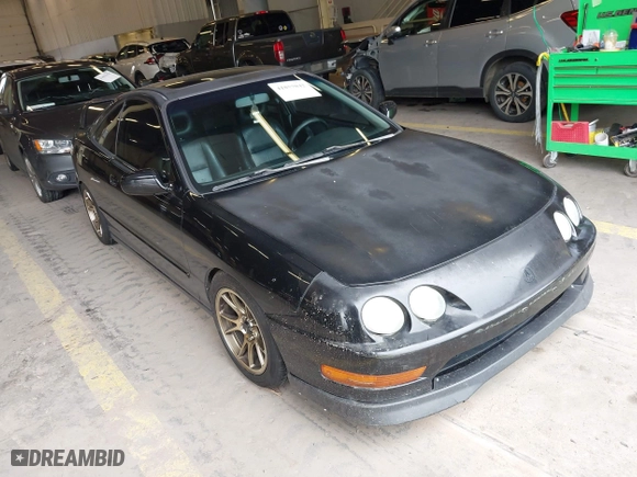 1999 Acura Integra GS-R with VIN JH4DC2397XS001674, listed as a IAAI auction lot 41857042 with 205,494 mi miles. Bid and sale history available at carsss.com. Image 1.