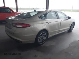 2017 Ford Fusion Titanium with VIN 3FA6P0K96HR346749, listed as a IAAI auction lot 42464431 with 134,933 mi miles and . Bid and sale history available at DreamBid. Image 4.