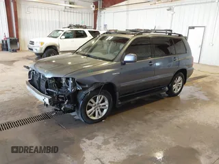 2006 Toyota Highlander Hybrid with VIN JTEDW21AX60002782, listed as a IAAI auction lot 41979903 with 295,778 mi miles. Bid and sale history available at carsss.com. Image 2.