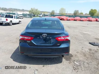 2019 Toyota Camry LE with VIN 4T1B11HK6KU276644, listed as a IAAI auction lot 42037249 with 23,677 mi miles and . Bid and sale history available at DreamBid. Image 16.