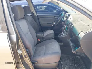 2005 Toyota Matrix STD with VIN 2T1KR32E05C399465, listed as a IAAI auction lot 42084140 with 147,281 mi miles. Bid and sale history available at carsss.com. Image 5.