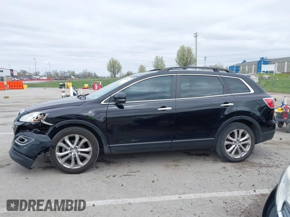 2011 Mazda CX-9 Grand Touring z VIN JM3TB2DAXB0300466, wystawiony jako IAAI lot #41921411 z przebiegiem 196 257 mil mil oraz . Historia ofert i sprzedaży dostępna na DreamBid. Obrazek 14.