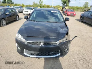 2016 Mitsubishi Lancer GT with VIN JA32U8FW8GU600984, listed as a Copart auction lot 71056634 with 150,497 mi miles and Salvage Title. Bid and sale history available at carsss.com. Image 5.