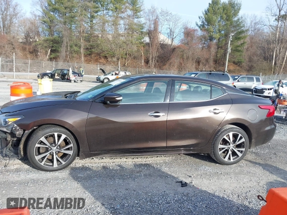 2016 Nissan Maxima SL z VIN 1N4AA6AP9GC385718, wystawiony jako IAAI lot #41099349 z przebiegiem 108 841 mil mil oraz . Historia ofert i sprzedaży dostępna na DreamBid. Obrazek 14.