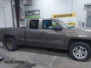 2014 Chevrolet Silverado 1500 LT with VIN 1GCVKREC9EZ240612, listed as a IAAI auction lot 41108566 with 200,625 mi miles and . Bid and sale history available at DreamBid. Image 14.