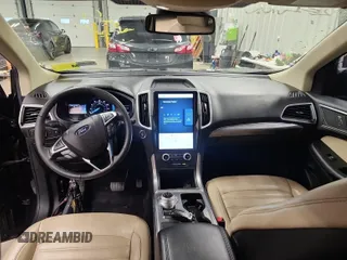 2022 Ford Edge SEL z VIN 2FMPK4J96NBA70794, wystawiony jako IAAI lot #42488707 z przebiegiem 78 465 mil mil oraz . Historia ofert i sprzedaży dostępna na DreamBid. Obrazek 1.