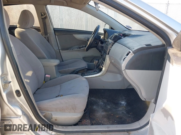 2011 Toyota Corolla L with VIN JTDBU4EE0BJ102517, listed as a IAAI auction lot 41702532 with 296,646 mi miles. Bid and sale history available at carsss.com. Image 5.